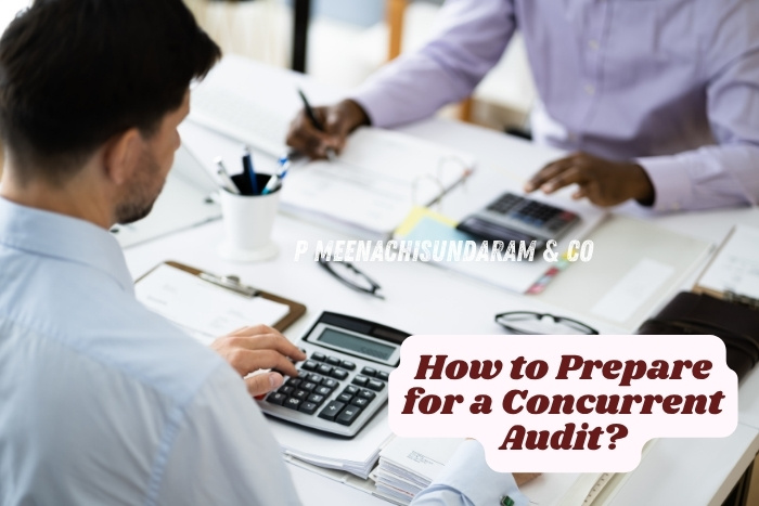 Accountants reviewing financial statements and calculating reports during audit planning at P Meenachisundaram & Co, Coimbatore